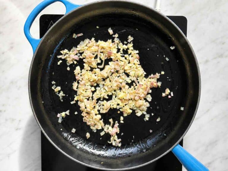 Step 1 Shallot and garlic softening in olive oil in a skillet.