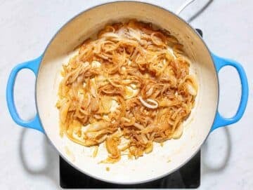 Step 1 Sliced onions cooking until deeply golden and jammy with balsamic vinegar.
