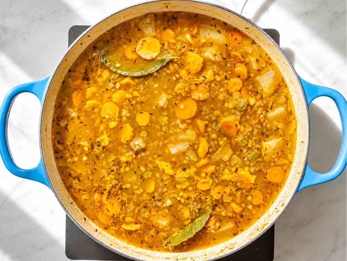 Step 2 French lentils and diced potatoes gently simmering in savory vegetable broth.