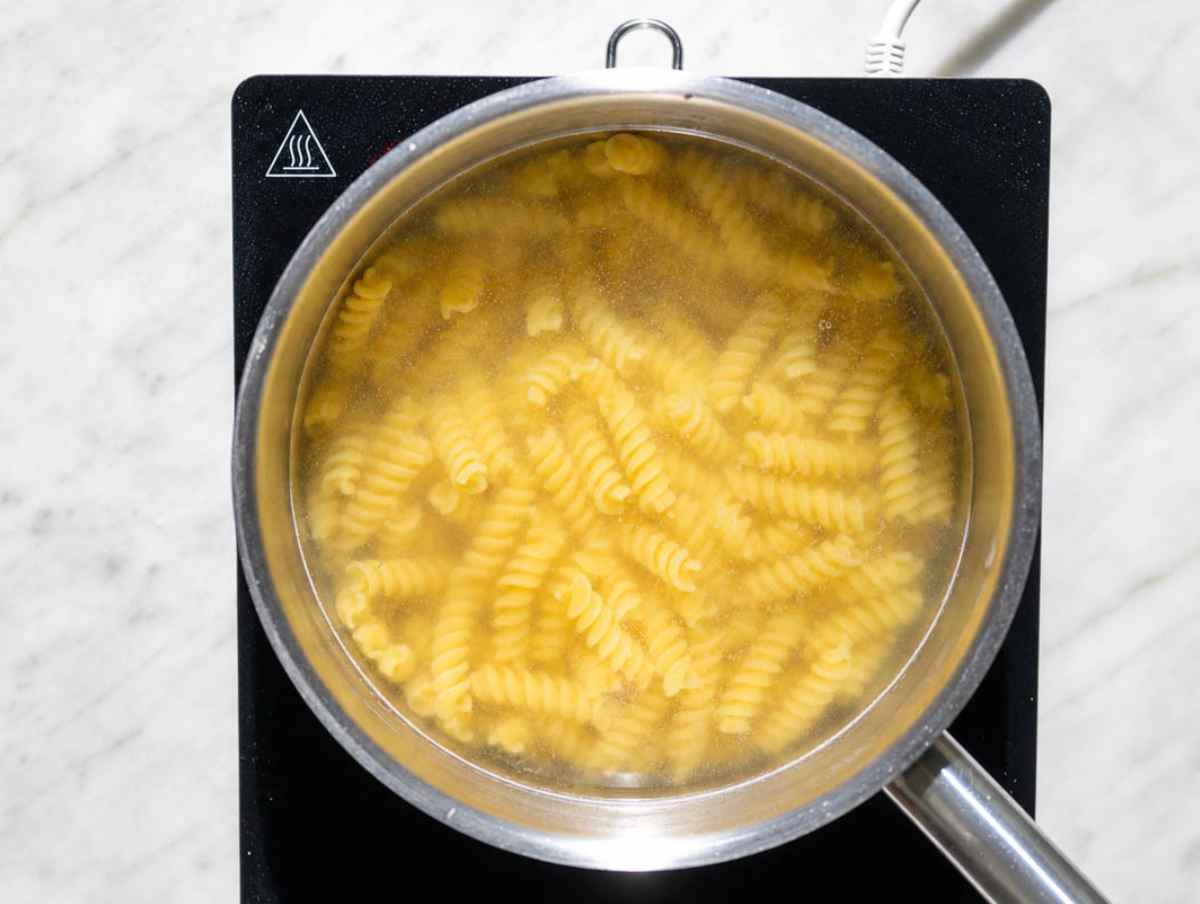 Step 2 Fusilli cooking until al dente in a pot of salted water.
