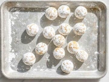 Step 2 Lemon almond cookie dough balls rolled generously in powdered sugar.