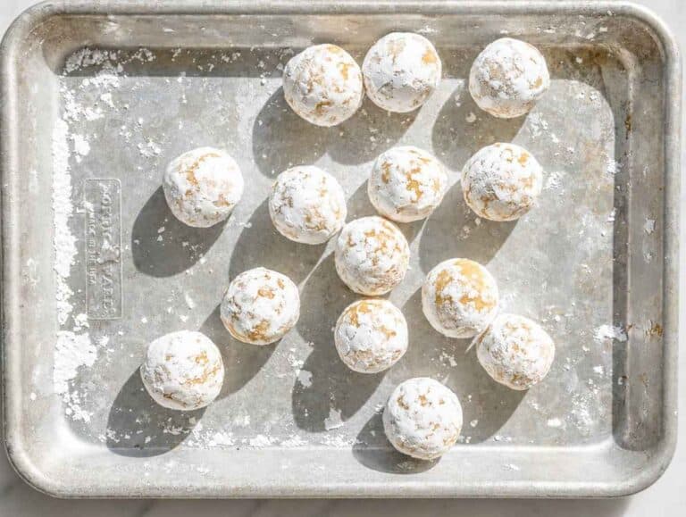 Step 2 Lemon almond cookie dough balls rolled generously in powdered sugar.