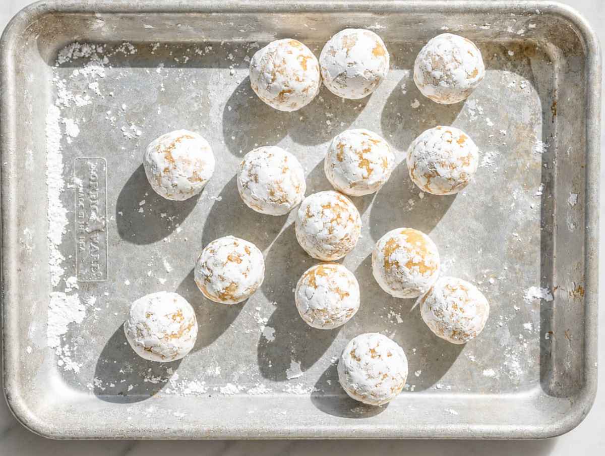 Step 2 Lemon almond cookie dough balls rolled generously in powdered sugar.