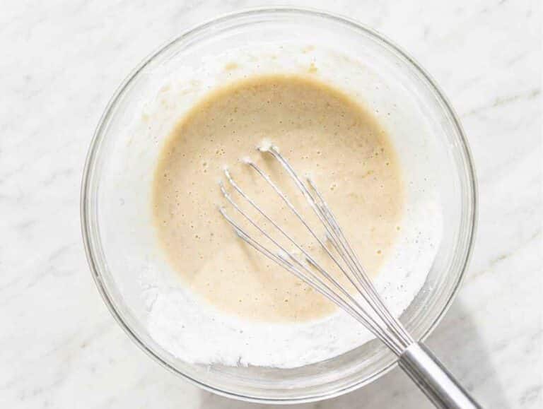 Step 2 Mashed bananas mixed with Greek yogurt, milk, and vanilla until smooth.