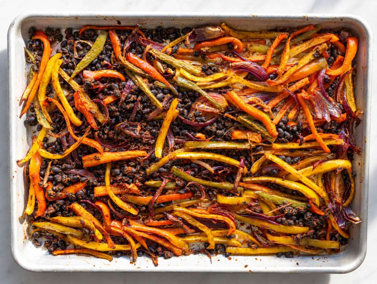 Step 2 Roasted black beans, peppers, and onions with lightly charred edges.