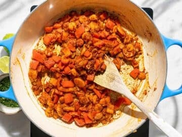 Step 2 Tomato paste, garlic, spices, and seasonings stirred into softened vegetables.