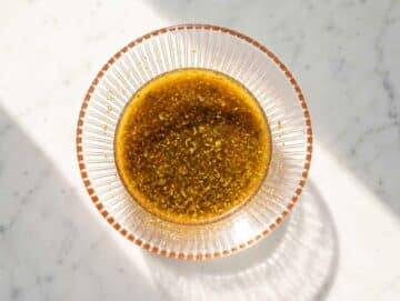 Step 2 tangy garlic, oregano, honey, and vinegar dressing.