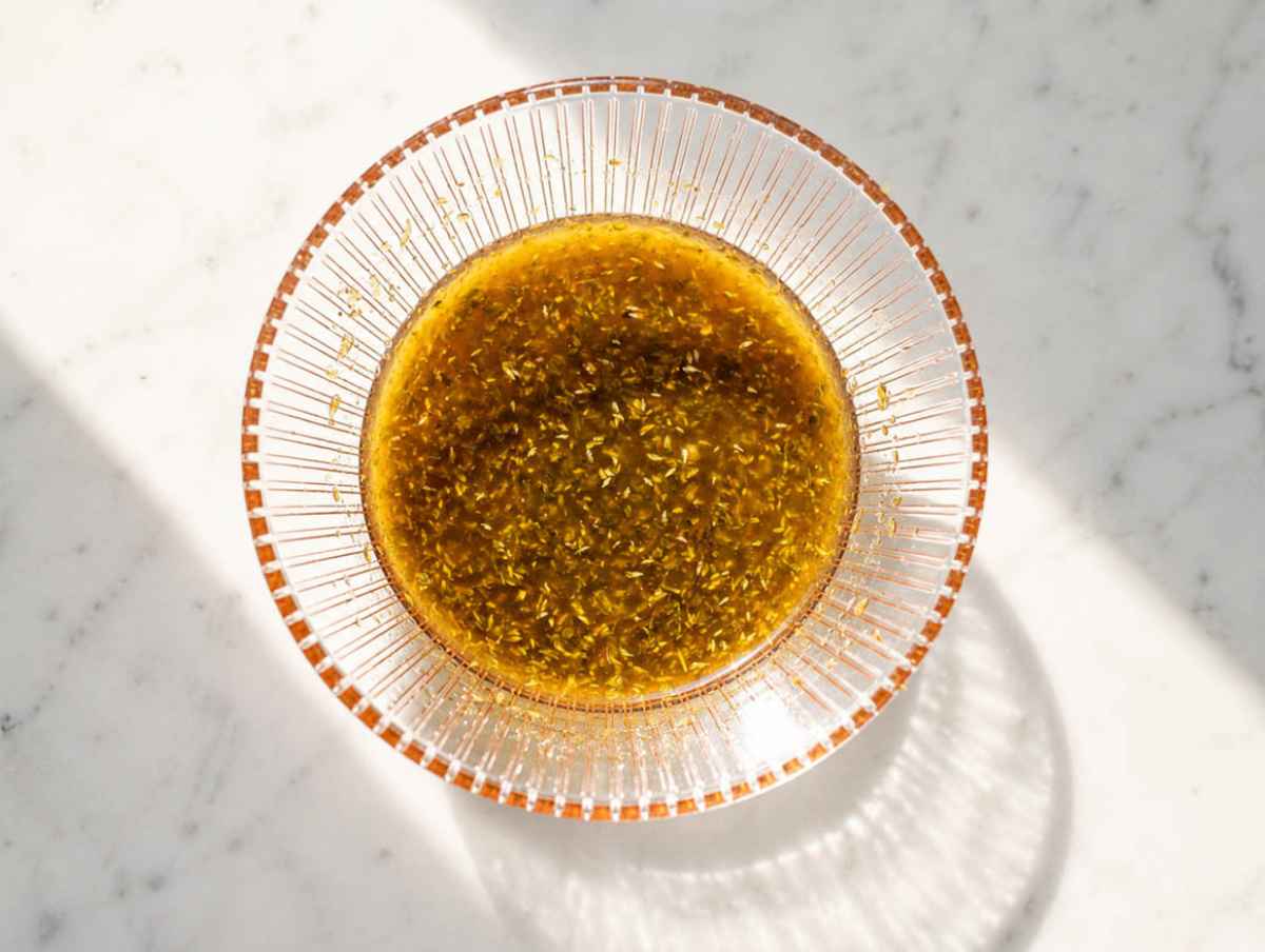 Step 2 tangy garlic, oregano, honey, and vinegar dressing.