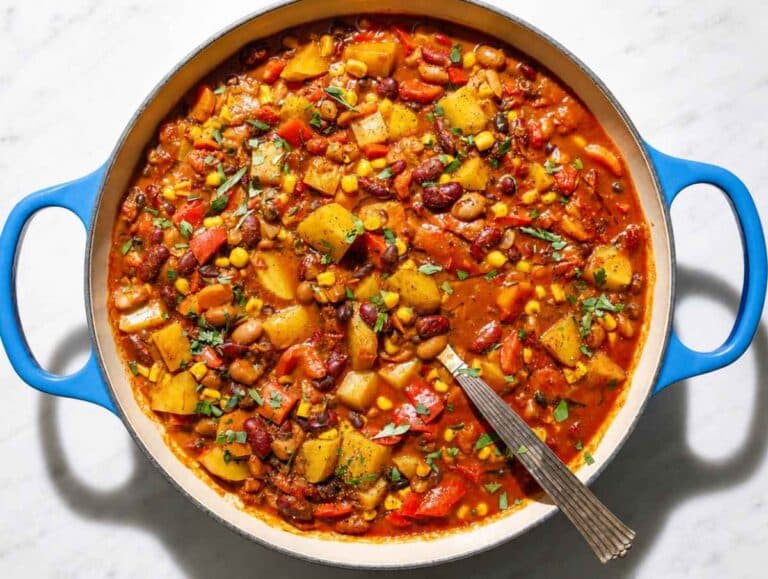 Step 3 Beans and potatoes simmering with crushed tomatoes and vegetable broth.