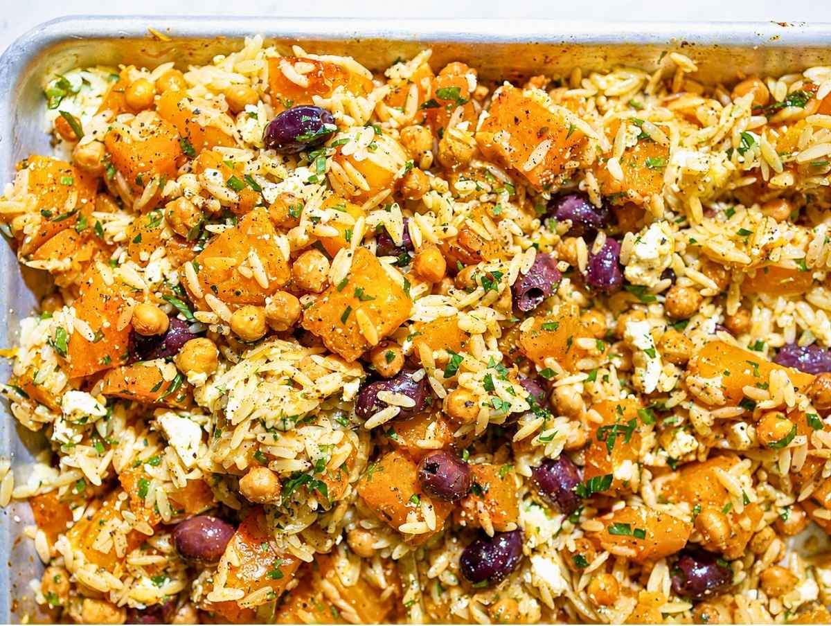 Step 3 Hot orzo tossed with roasted squash, chickpeas, feta, and dressing.