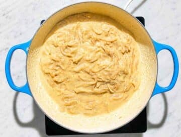 Step 3 Hummus and pasta water stirred into onions until smooth and creamy.