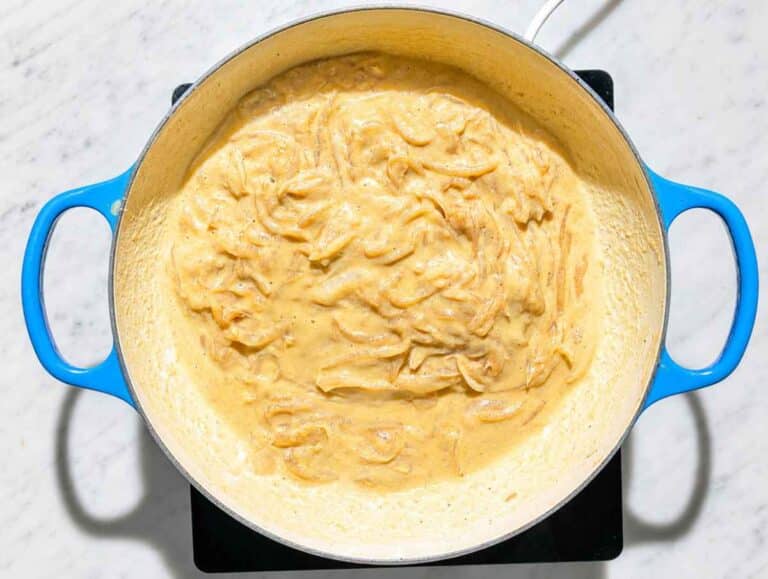 Step 3 Hummus and pasta water stirred into onions until smooth and creamy.