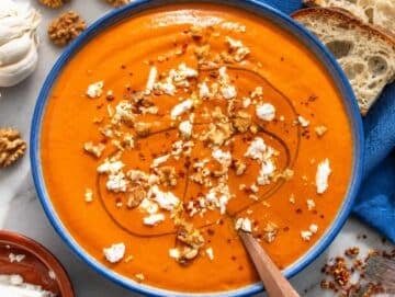Step 3 Roasted red pepper soup topped with walnuts, feta, and olive oil.