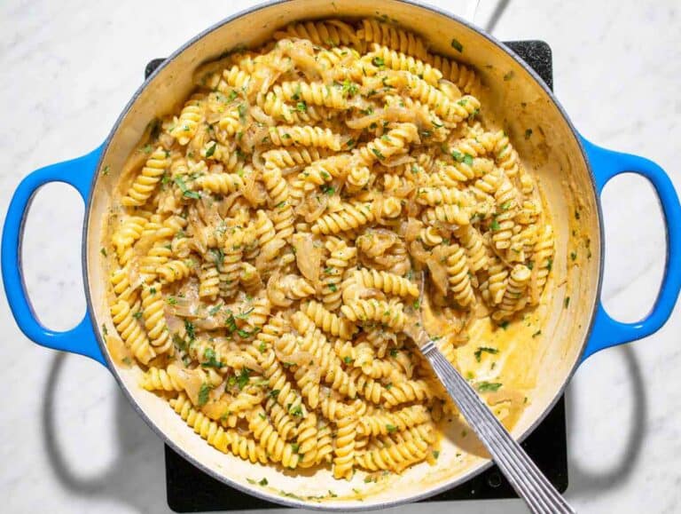 Step 4 Fusilli tossed with creamy caramelized onion sauce, parsley, and black pepper.