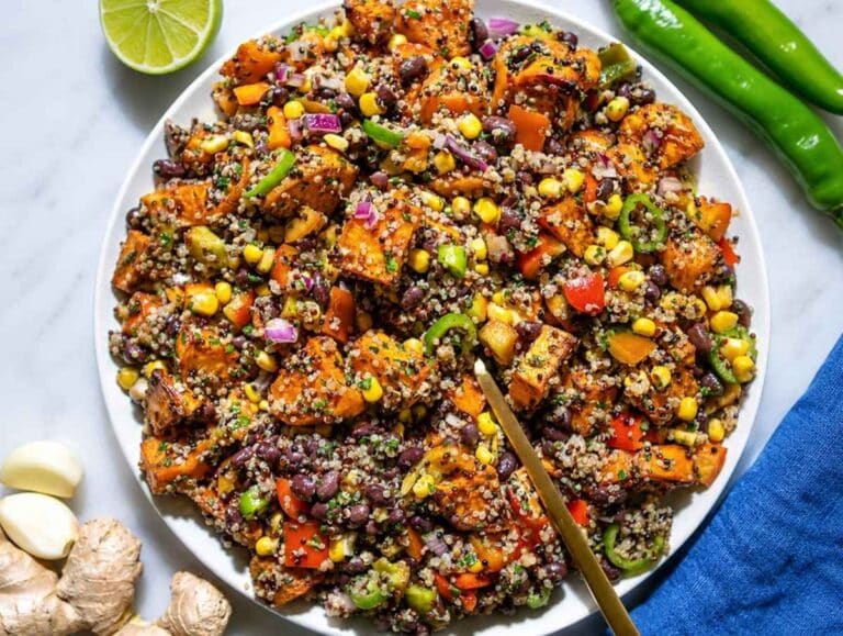 Step 4 Quinoa, roasted sweet potatoes, beans, corn, and vegetables tossed together