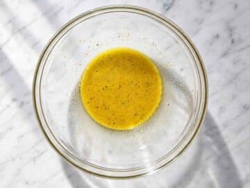 Step 1 Honey mustard dressing whisked until smooth in a large mixing bowl.