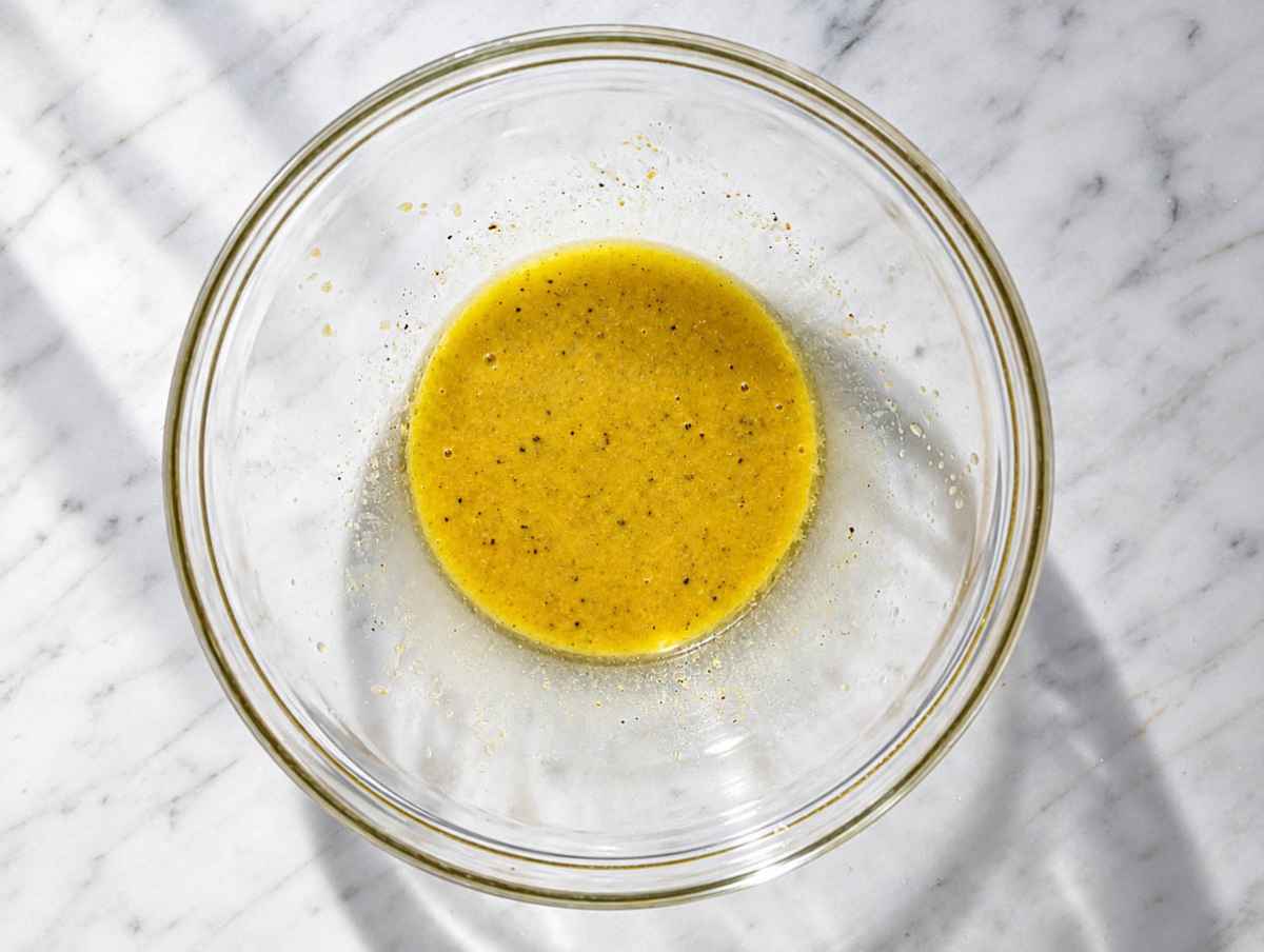 Step 1 Honey mustard dressing whisked until smooth in a large mixing bowl.