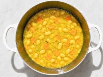 Step 2 Butter beans simmering with seasoned vegetables in golden vegetable broth