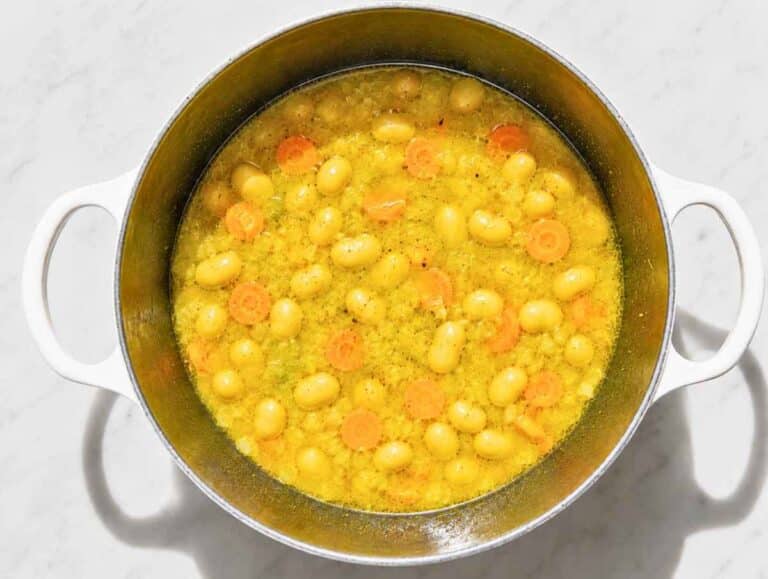 Step 2 Butter beans simmering with seasoned vegetables in golden vegetable broth