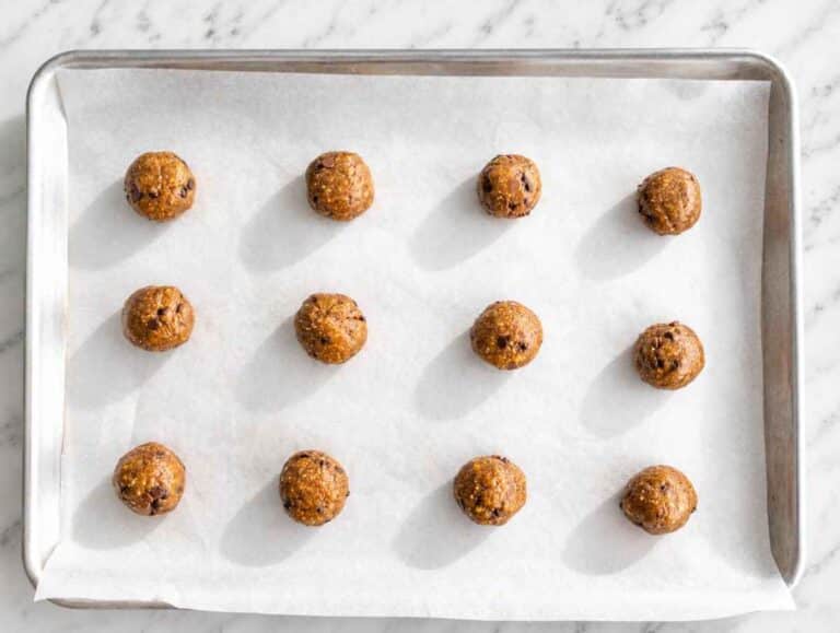 Step 2 Cookie dough balls spaced apart on a parchment-lined baking sheet.