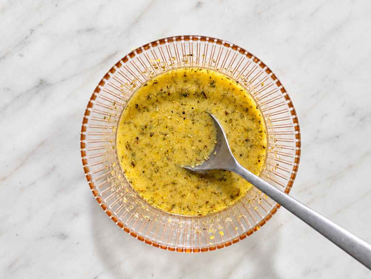 Step 2 Honey mustard dressing with lemon, olive oil, oregano, and grated garlic.