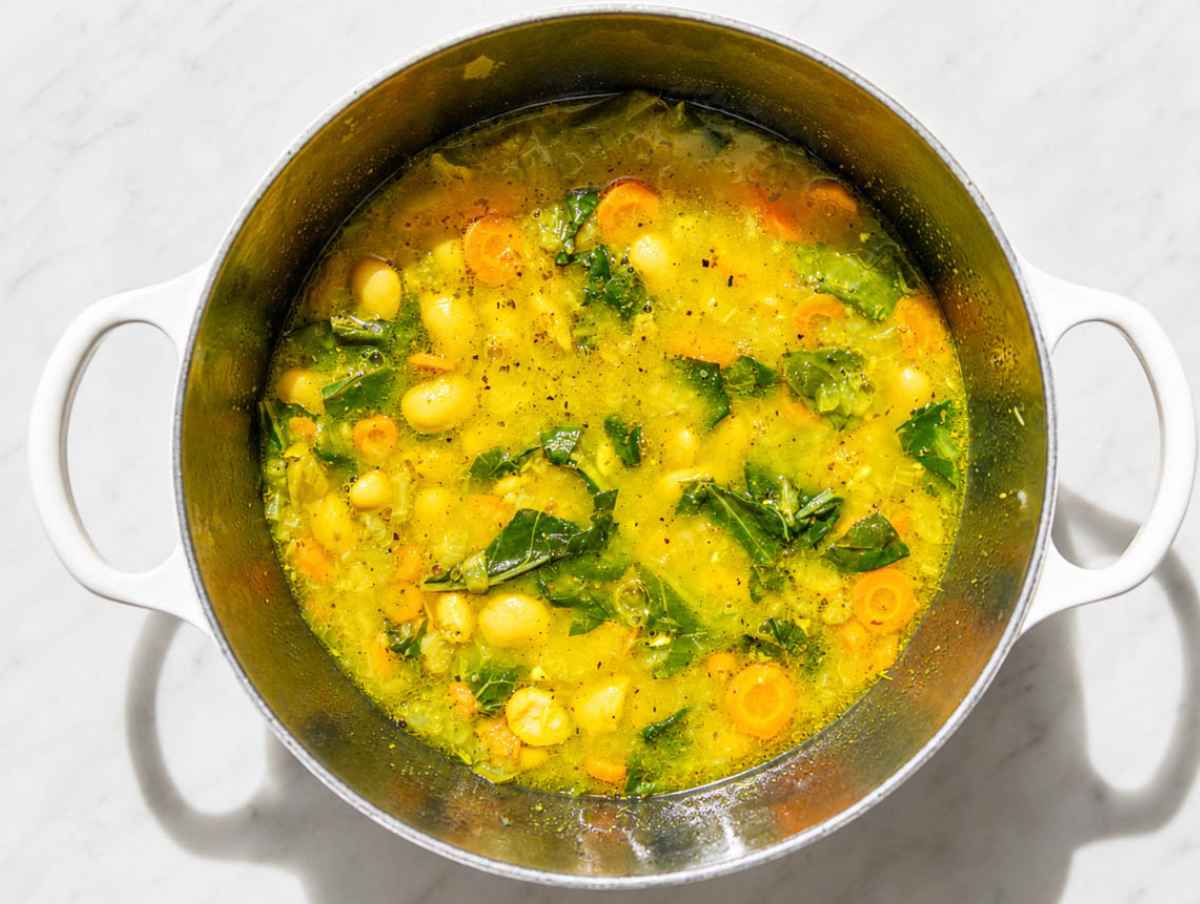 Step 3 Fresh spinach and lemon stirred into the golden butter bean soup