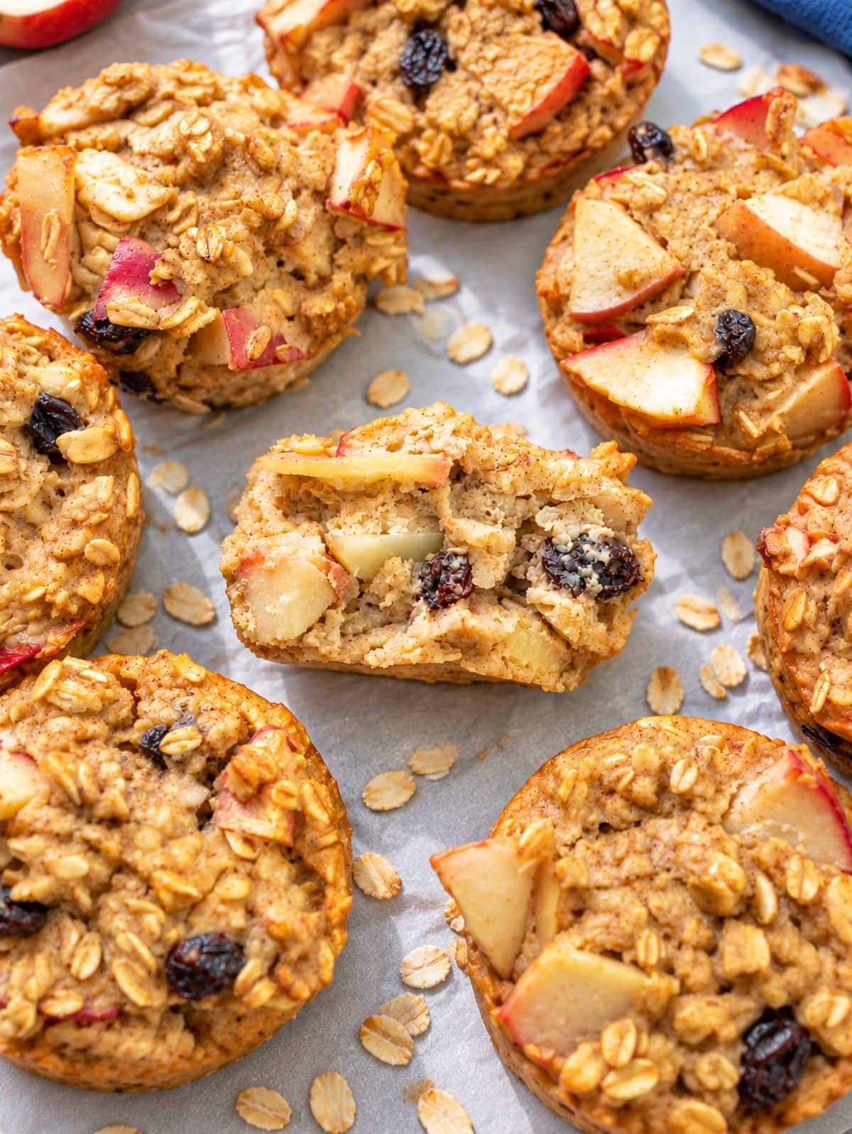 Close-up of an opened oatmeal cup showing tender oats and soft apples.