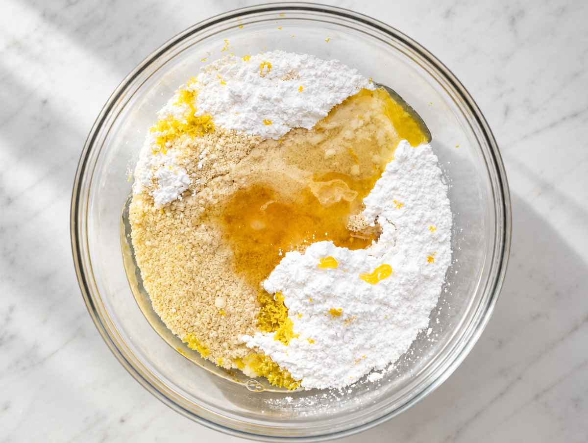 Step 1 Almond flour, sugar, egg white, honey, and lemon zest in a mixing bowl.
