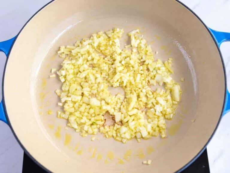 Step 1 Chopped onion softening in olive oil in a large skillet.
