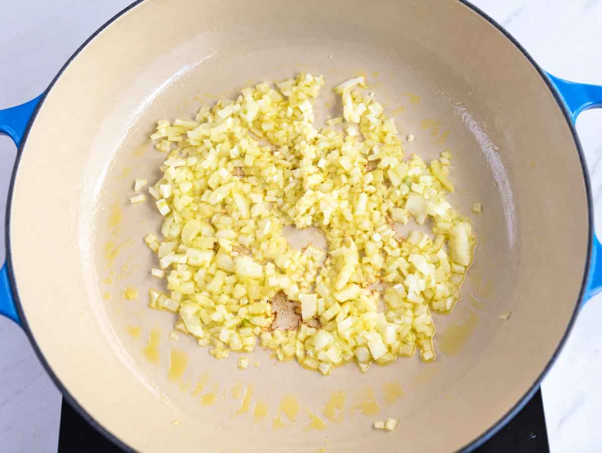 Step 1 Chopped onion softening in olive oil in a large skillet.