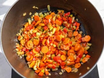 Step 1 Onion, carrots, and bell pepper sautéing in olive oil.