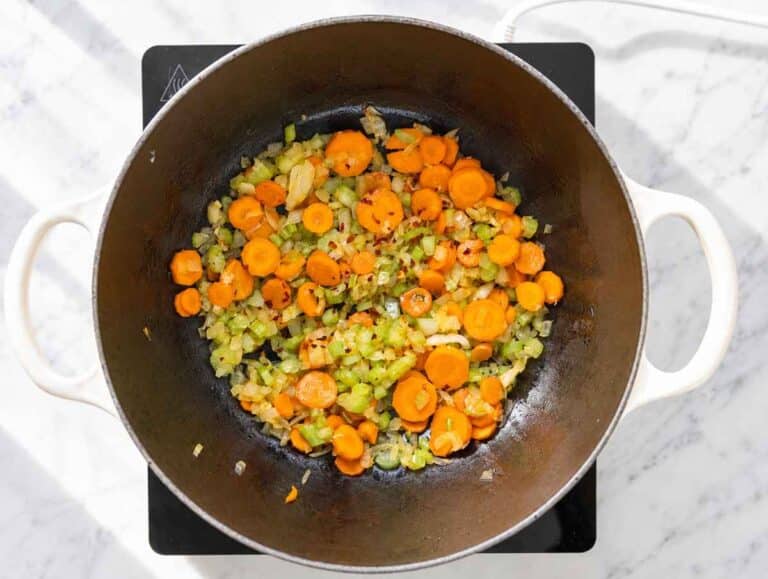 Step 1 Onion, carrots, and celery sautéing with garlic and red pepper flakes.