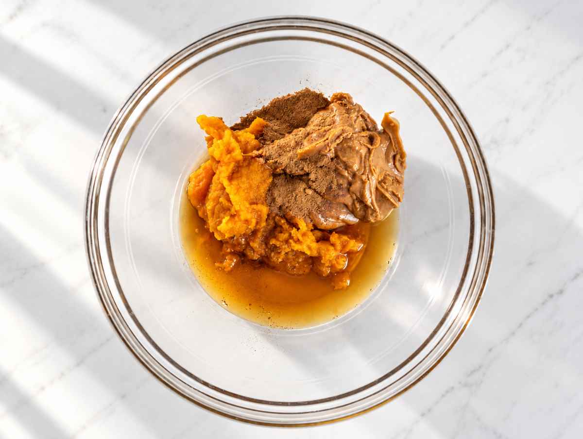 Step 1 Pumpkin pureฬe, peanut butter, maple syrup, and spices mixed until smooth.