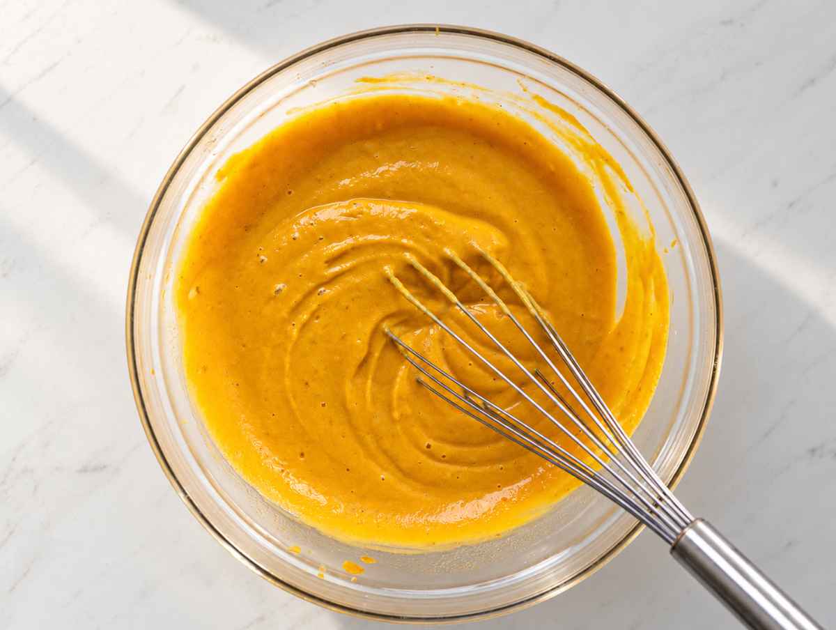 Step 1 Smooth pumpkin, Greek yogurt, maple syrup, and egg mixture in a bowl.