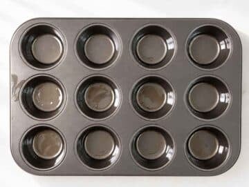 Step 1 – Lightly greased nonstick muffin pan ready for the batter.