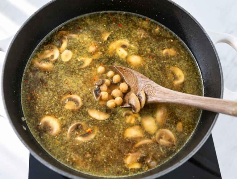 Step 2 Chickpeas and mushrooms simmering in a savory broth.