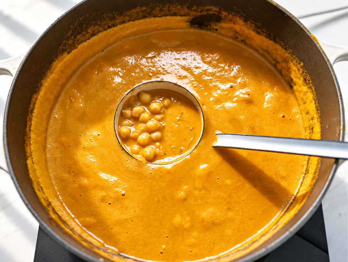 Step 2 Chickpeas simmering in smooth, golden peanut butter broth.