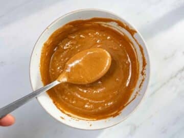 Step 2 Smooth peanut sauce in a bowl with a spoon.
