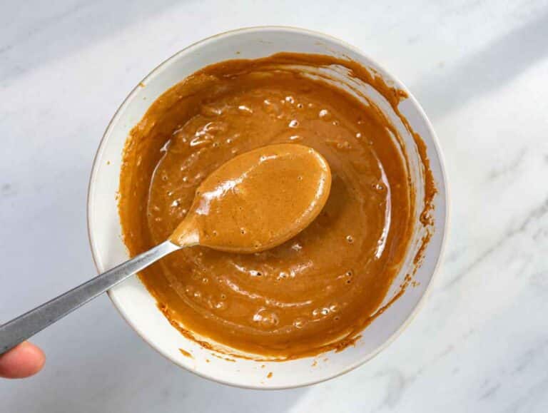 Step 2 Smooth peanut sauce in a bowl with a spoon.