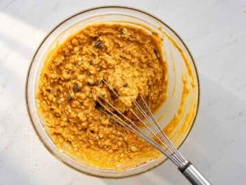 Step 2 Thick pumpkin oatmeal batter with rolled oats and raisins.