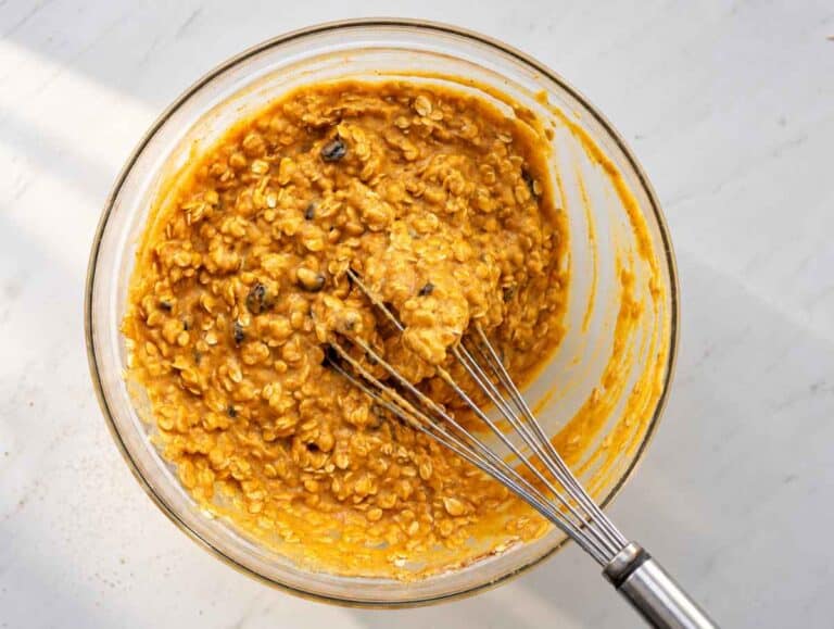 Step 2 Thick pumpkin oatmeal batter with rolled oats and raisins.