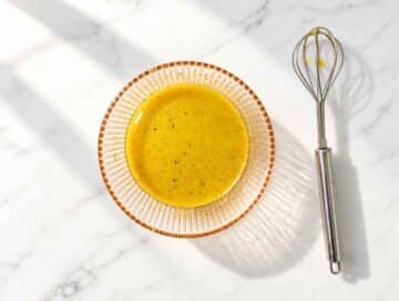 Step 2 – Lime dressing with mustard, olive oil, and spices in a small bowl.