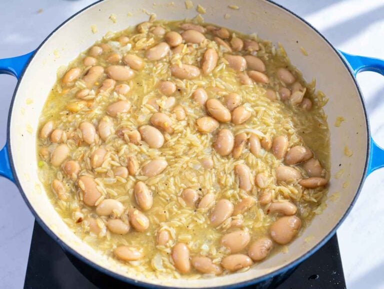 Step 3 Butter beans and orzo simmering together in creamy vegetable broth.