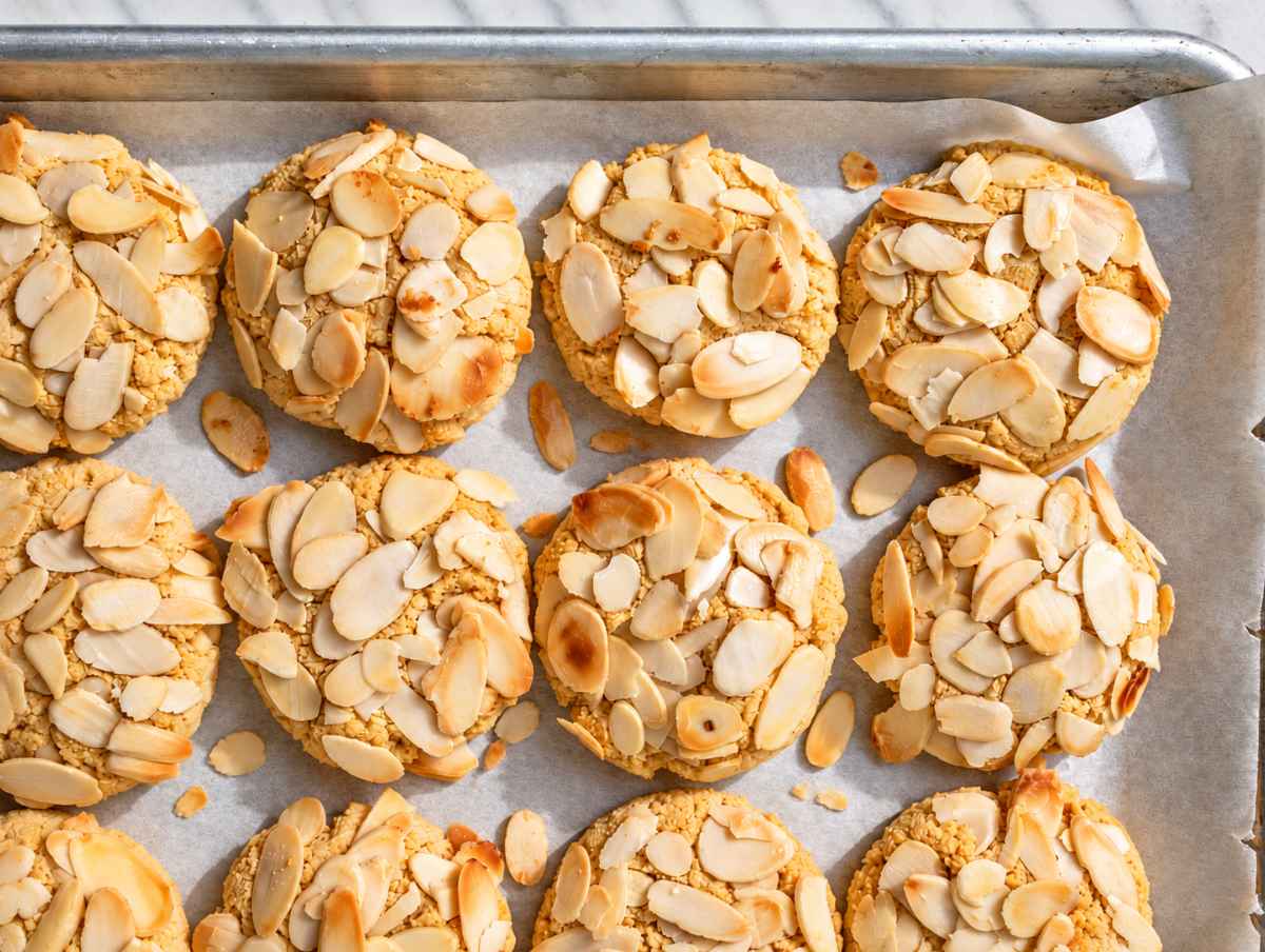 Step 3 Freshly baked cookies with golden edges and lightly toasted sliced almonds.