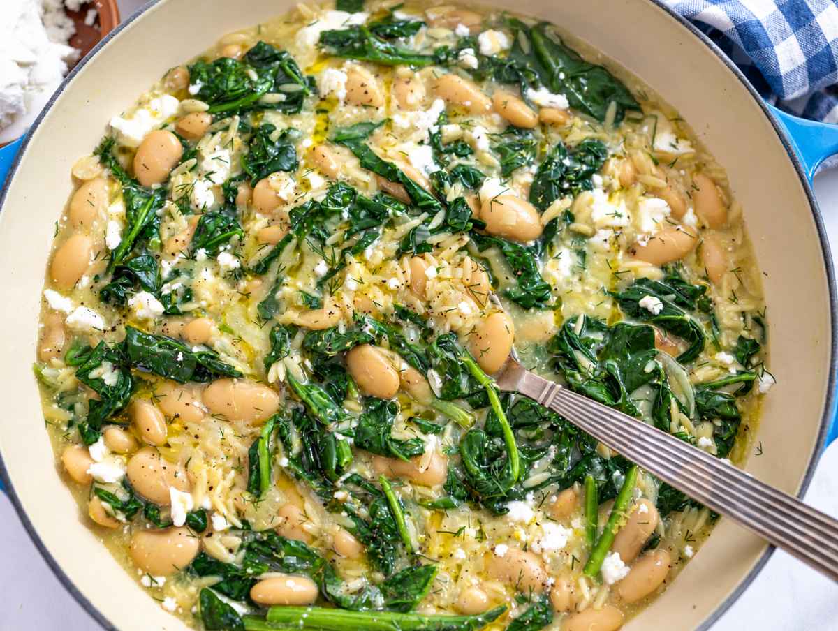 Step 4 - Creamy orzo with wilted spinach, crumbled feta, lemon, and fresh dill.