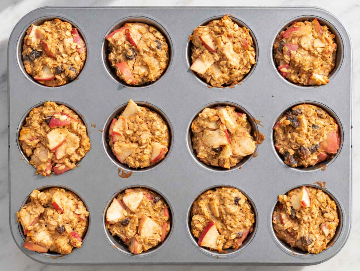 Step 4 Golden apple oatmeal cups cooling after baking until lightly browned.