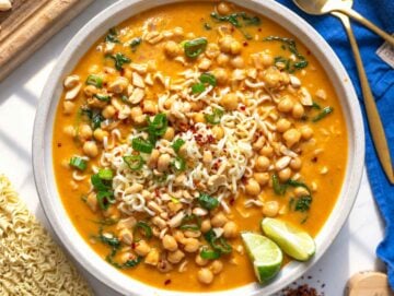 Step 4 Peanut soup ladled over noodles, topped with chopped peanuts and cilantro.