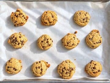 Step 4 – Thick, golden chocolate chip cookies cooling on baking sheet.