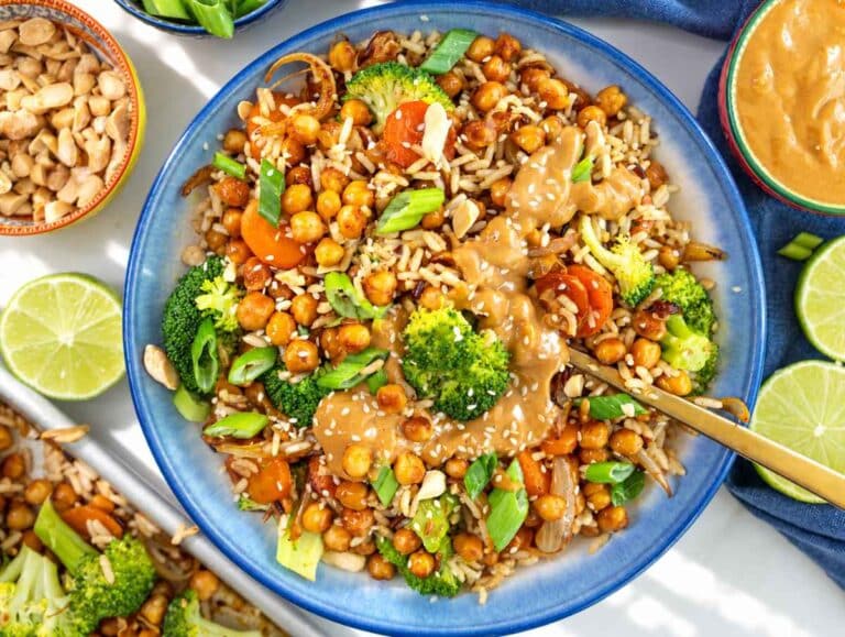 Step 5 Chickpea rice bowls drizzled with peanut sauce and topped with scallions.
